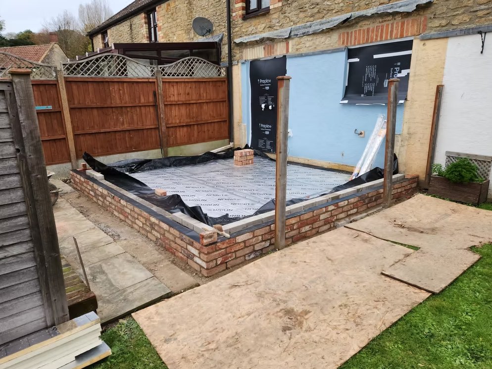 Brick inner leaf and steel goalpost on extension