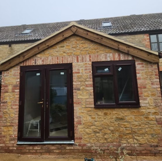 Aluminium windows and doors installed on hamstone extension